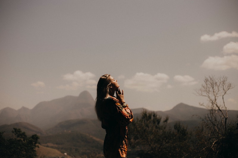 A girl looking at the horizon.